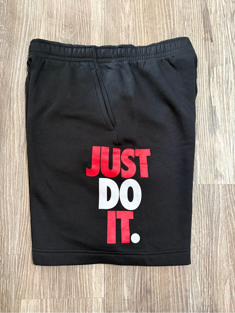 Nike Black Men’s Shorts with Red and White 'Just Do It.' Graphic